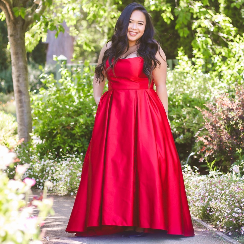 Red prom dress kept in new condition